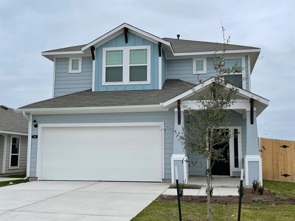 100 Crescent Street Georgetown, TX 78626 - Photo 1 of 17 a front view of a house with garage