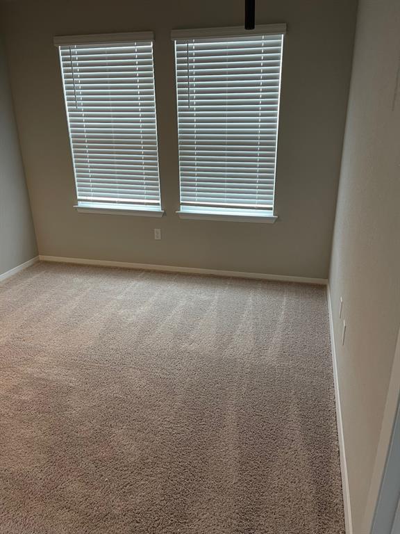 100 Crescent Street Georgetown, TX 78626 - Photo 10 of 17 a view of a room that has a window in it