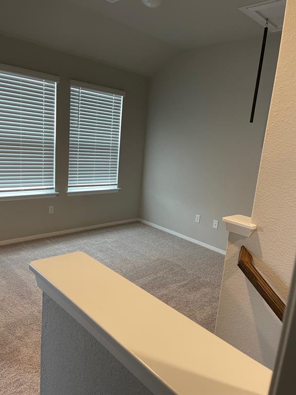 100 Crescent Street Georgetown, TX 78626 - Photo 11 of 17 a view of an empty room with a window