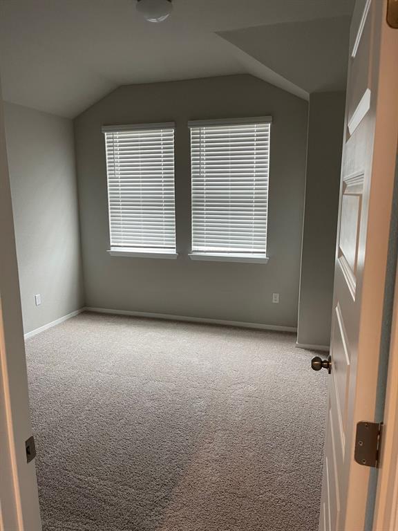 100 Crescent Street Georgetown, TX 78626 - Photo 13 of 17 an empty room with windows