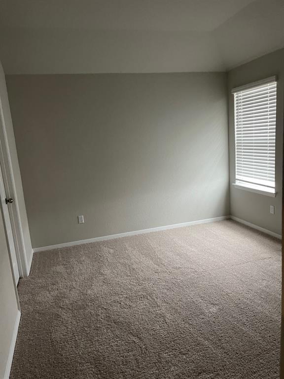 100 Crescent Street Georgetown, TX 78626 - Photo 14 of 17 an empty room with windows