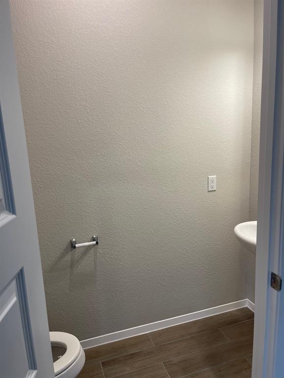 100 Crescent Street Georgetown, TX 78626 - Photo 16 of 17 a bathroom with a toilet