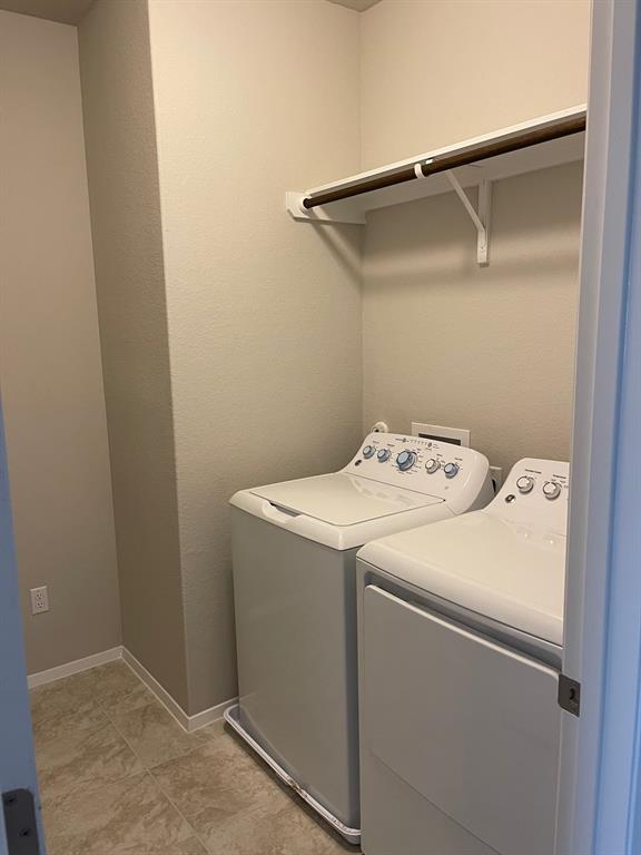 100 Crescent Street Georgetown, TX 78626 - Photo 9 of 17 a utility room with dryer and washer