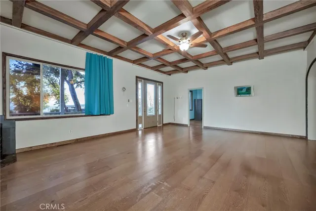 a view of front of house with a deck