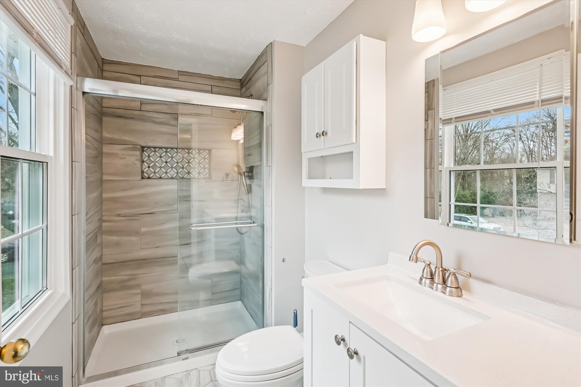 135 Applegate Drive Sterling, VA 20164 - Photo 14 of 42 a bathroom with a sink toilet and shower