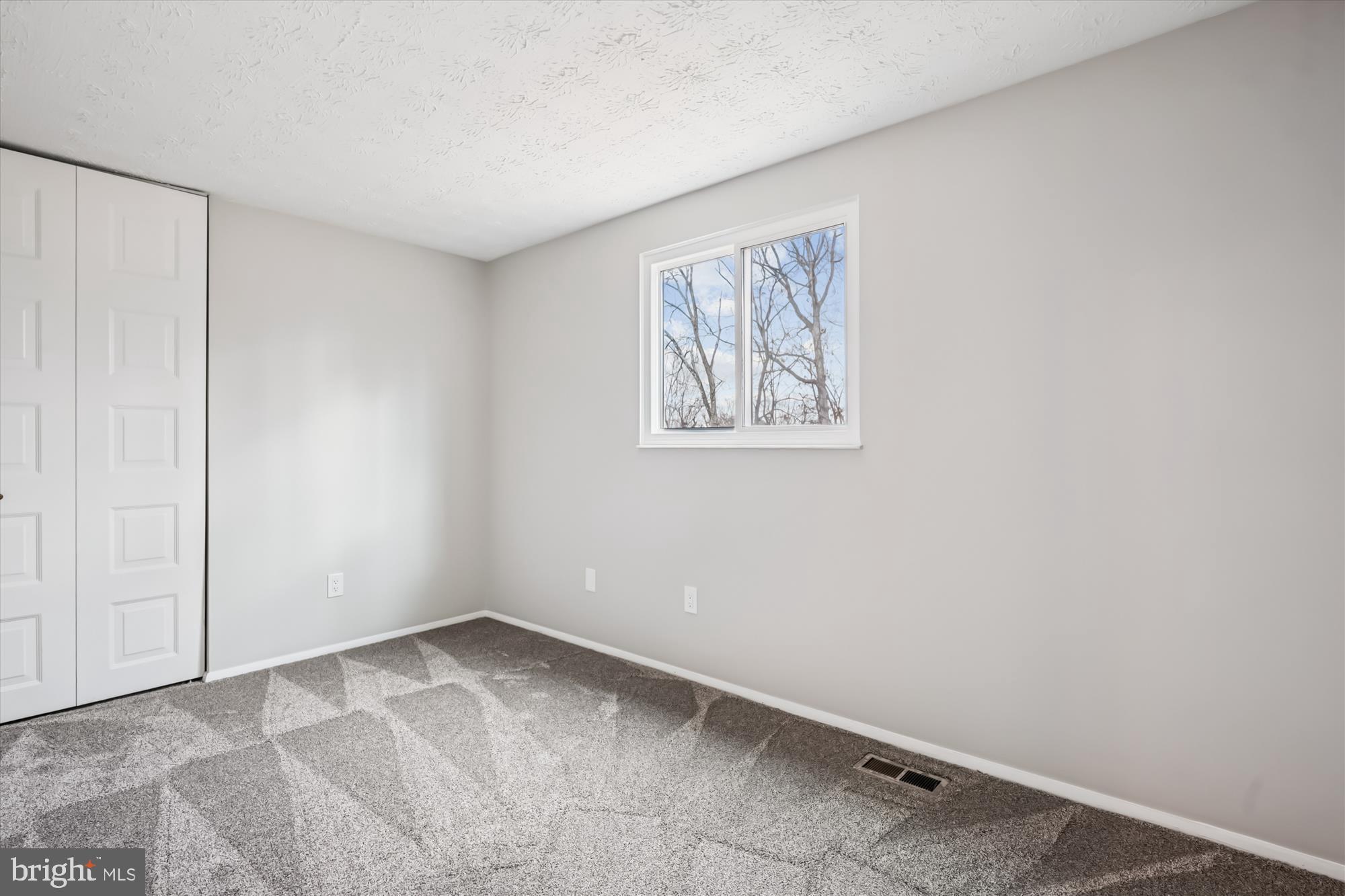 135 Applegate Drive Sterling, VA 20164 - Photo 19 of 42 a view of an empty room with a window