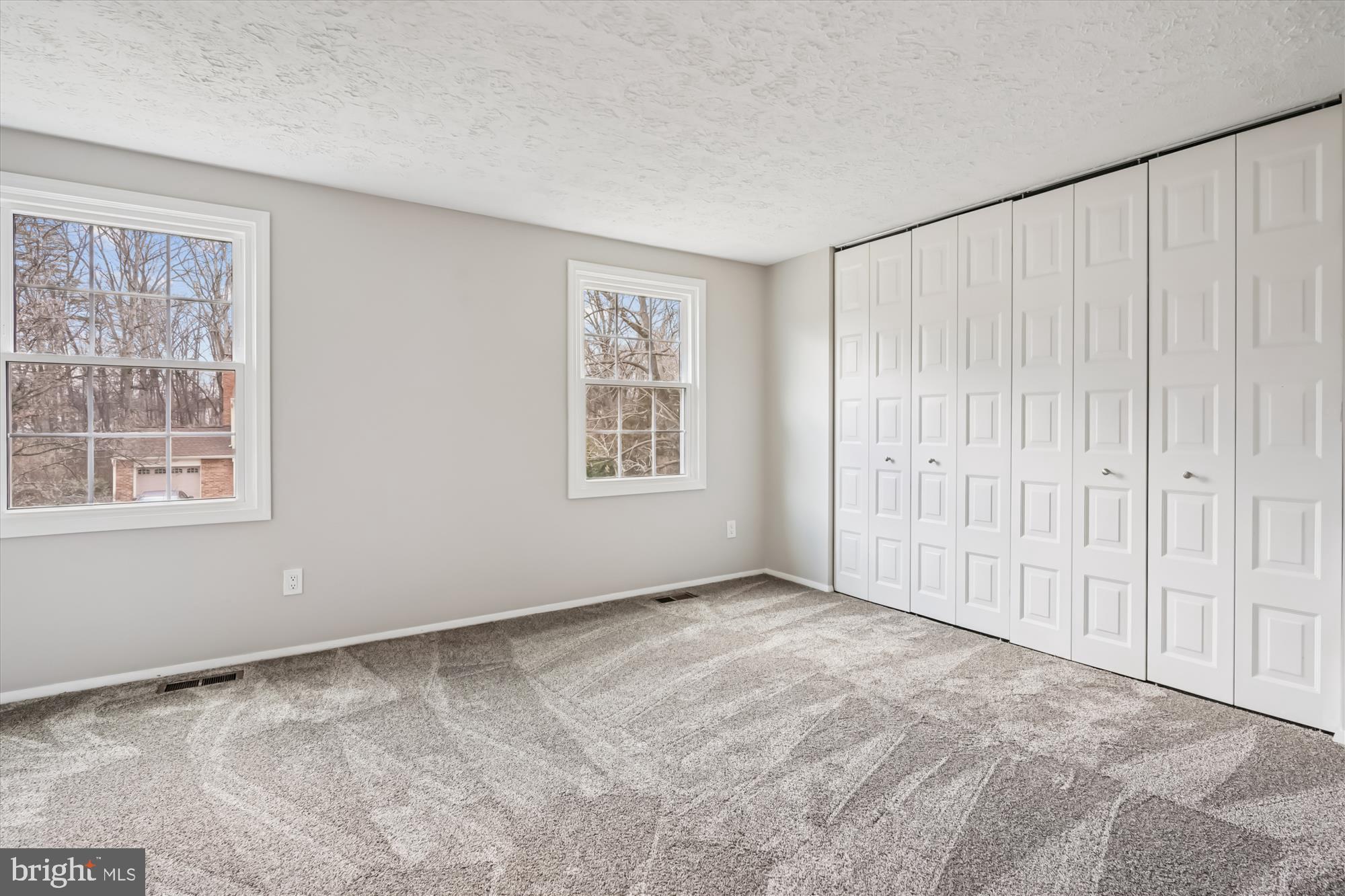 135 Applegate Drive Sterling, VA 20164 - Photo 20 of 42 a view of an empty room with a window