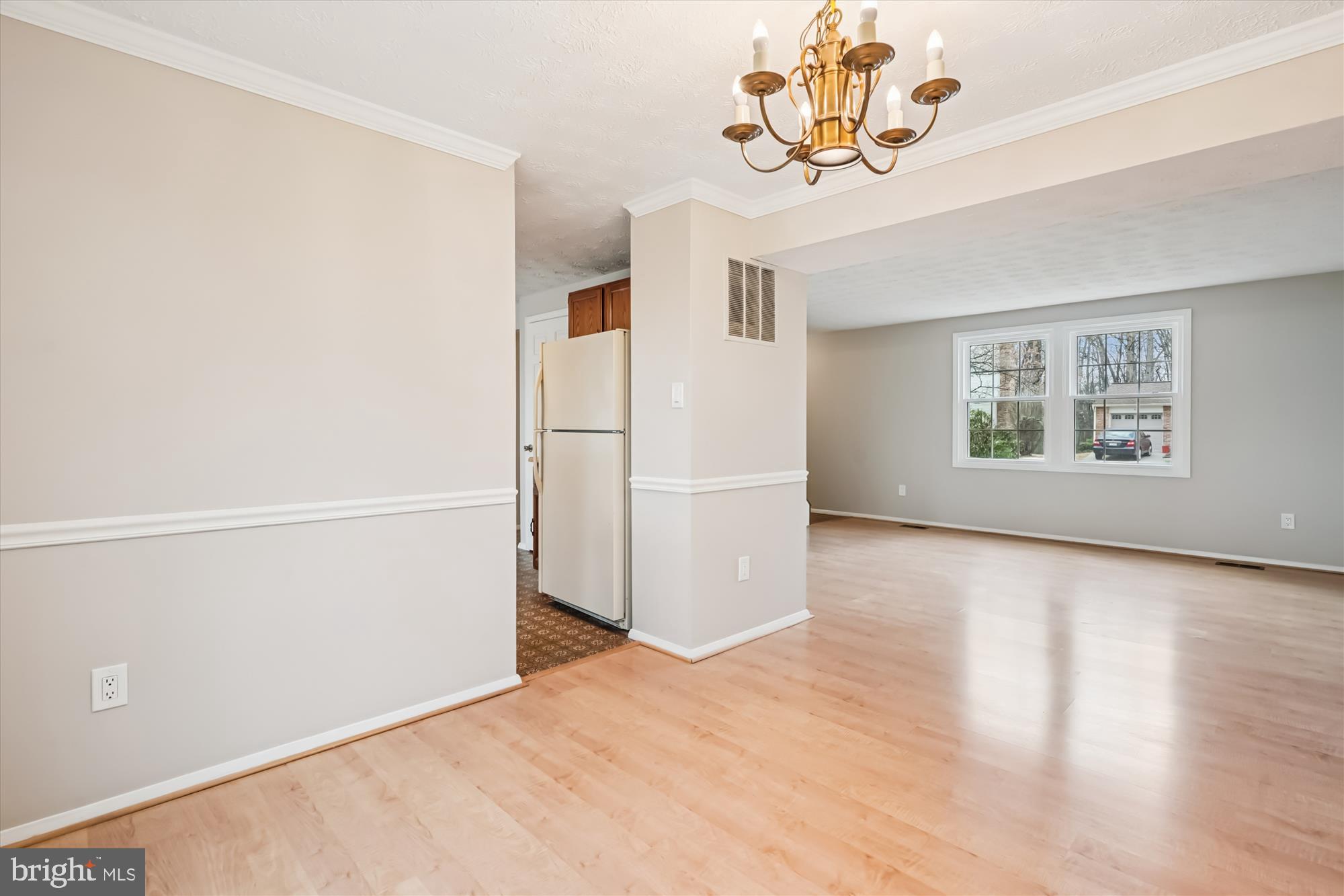135 Applegate Drive Sterling, VA 20164 - Photo 5 of 42 a view of a room with a window and wooden floor