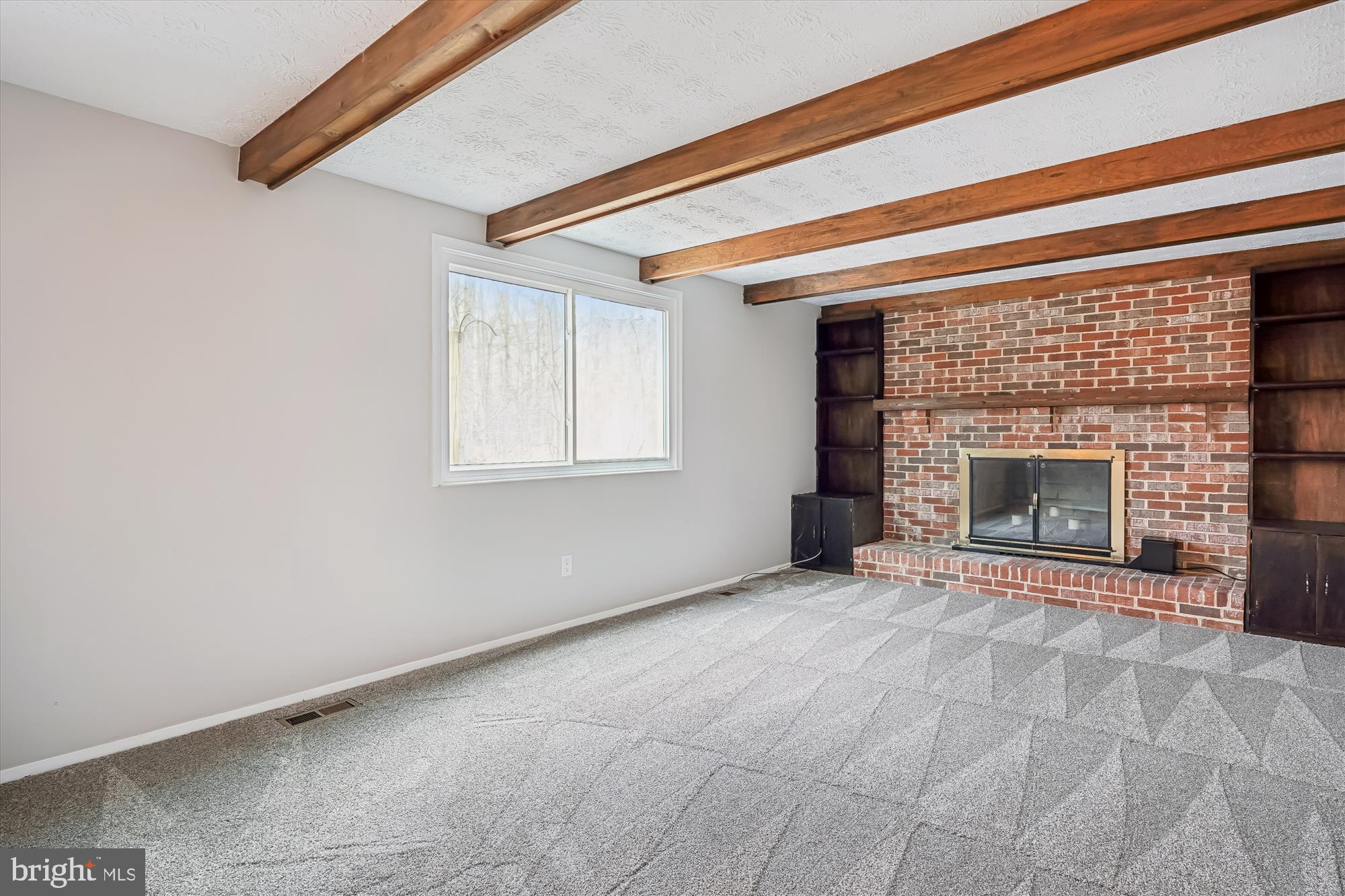 135 Applegate Drive Sterling, VA 20164 - Photo 7 of 42 a view of empty room with a fireplace