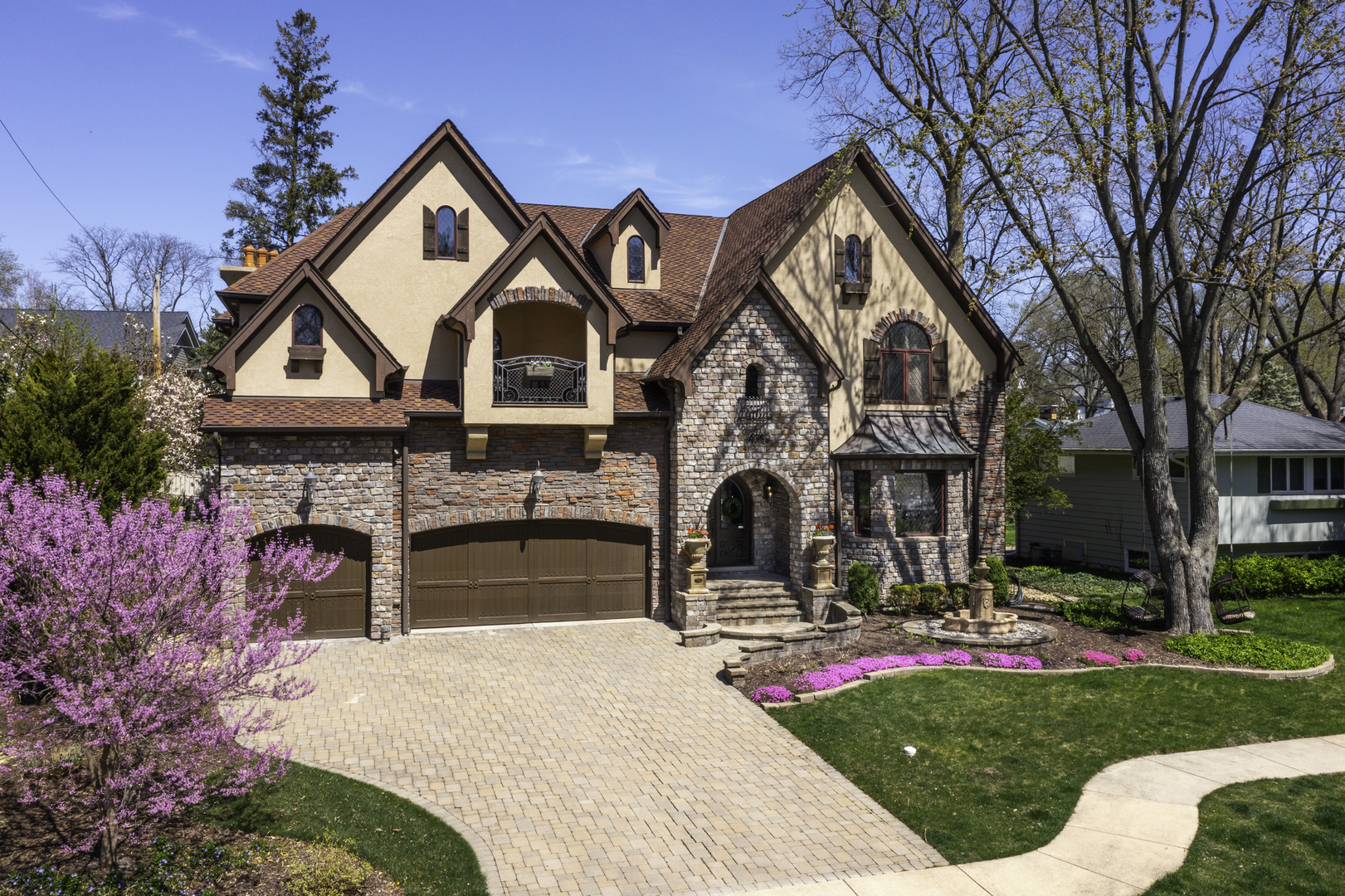 720 Willow Road Naperville, IL 60540 - Photo 1 of 1 a front view of a house with yard and green space