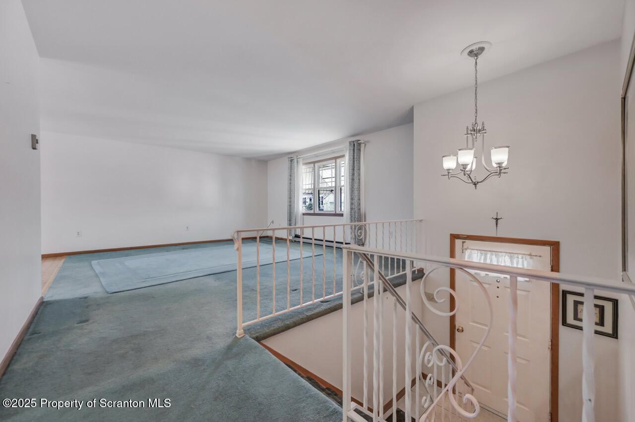 309 Lowery Street Scranton, PA 18505 - Photo 12 of 65 a view of a room with racks on the wall