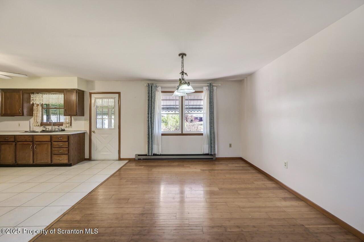 309 Lowery Street Scranton, PA 18505 - Photo 21 of 65 a view of a kitchen with a sink and window
