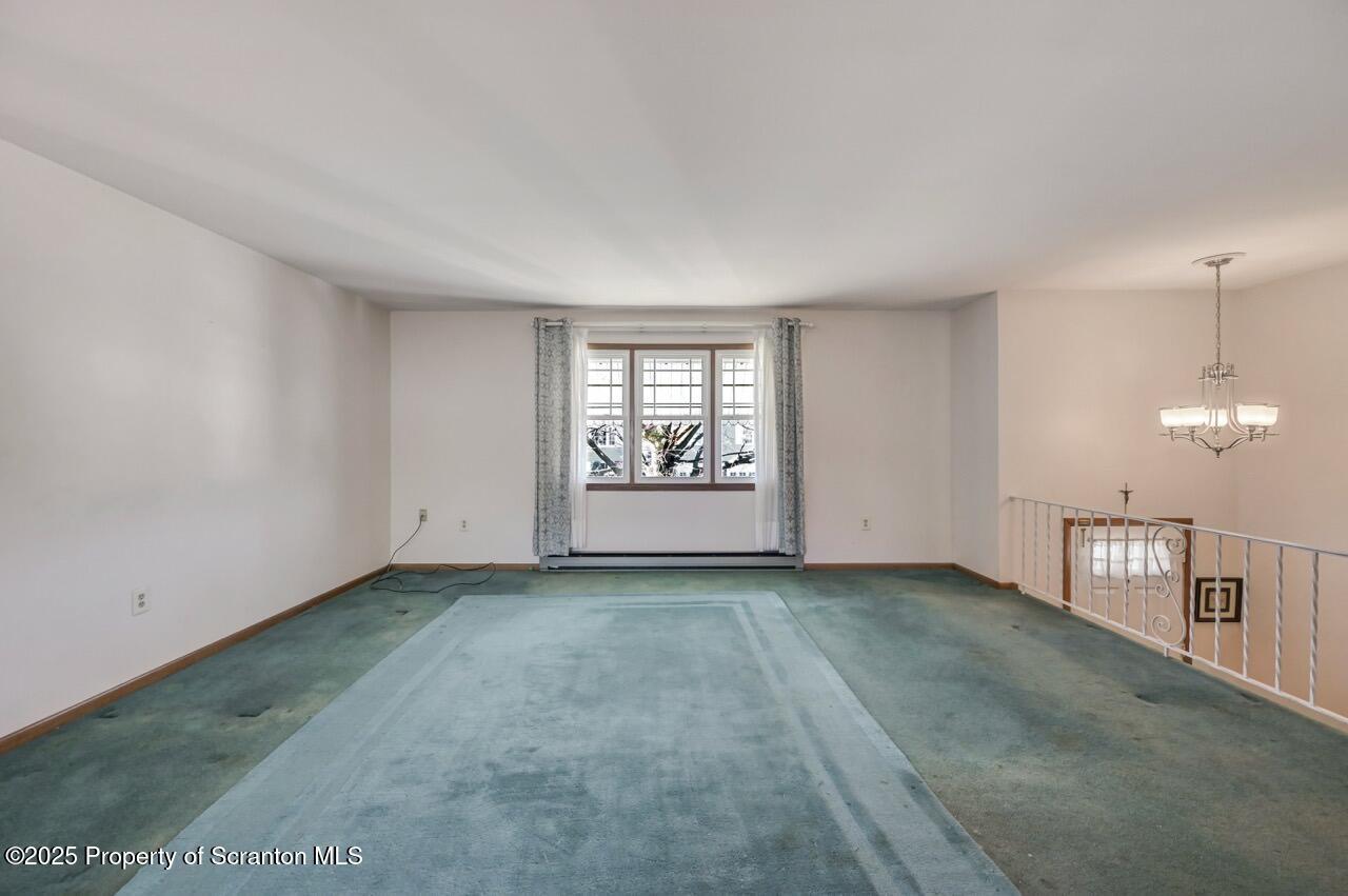 309 Lowery Street Scranton, PA 18505 - Photo 22 of 65 a view of an empty room with window