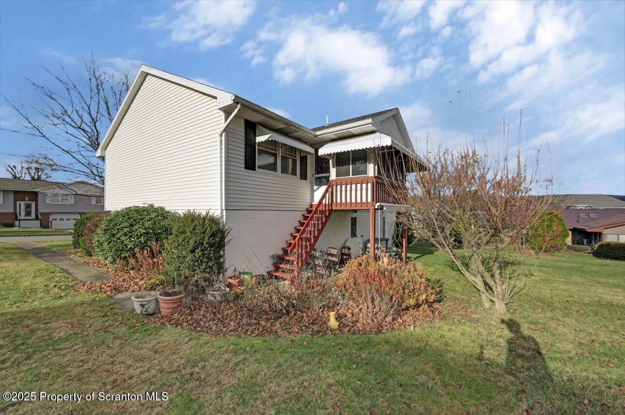 309 Lowery Street Scranton, PA 18505 - Photo 4 of 65 a front view of house with a garden