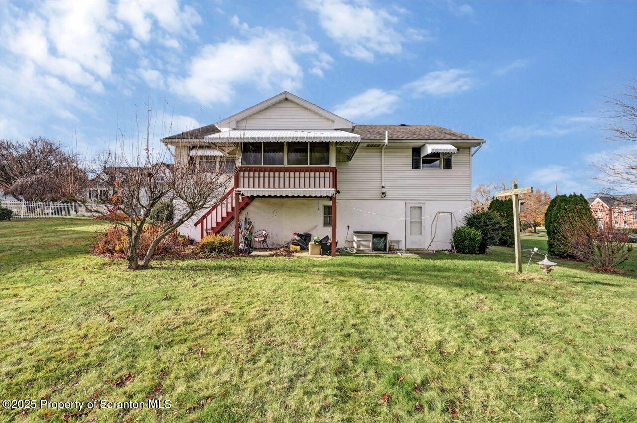 309 Lowery Street Scranton, PA 18505 - Photo 5 of 65 a front view of a house with a yard