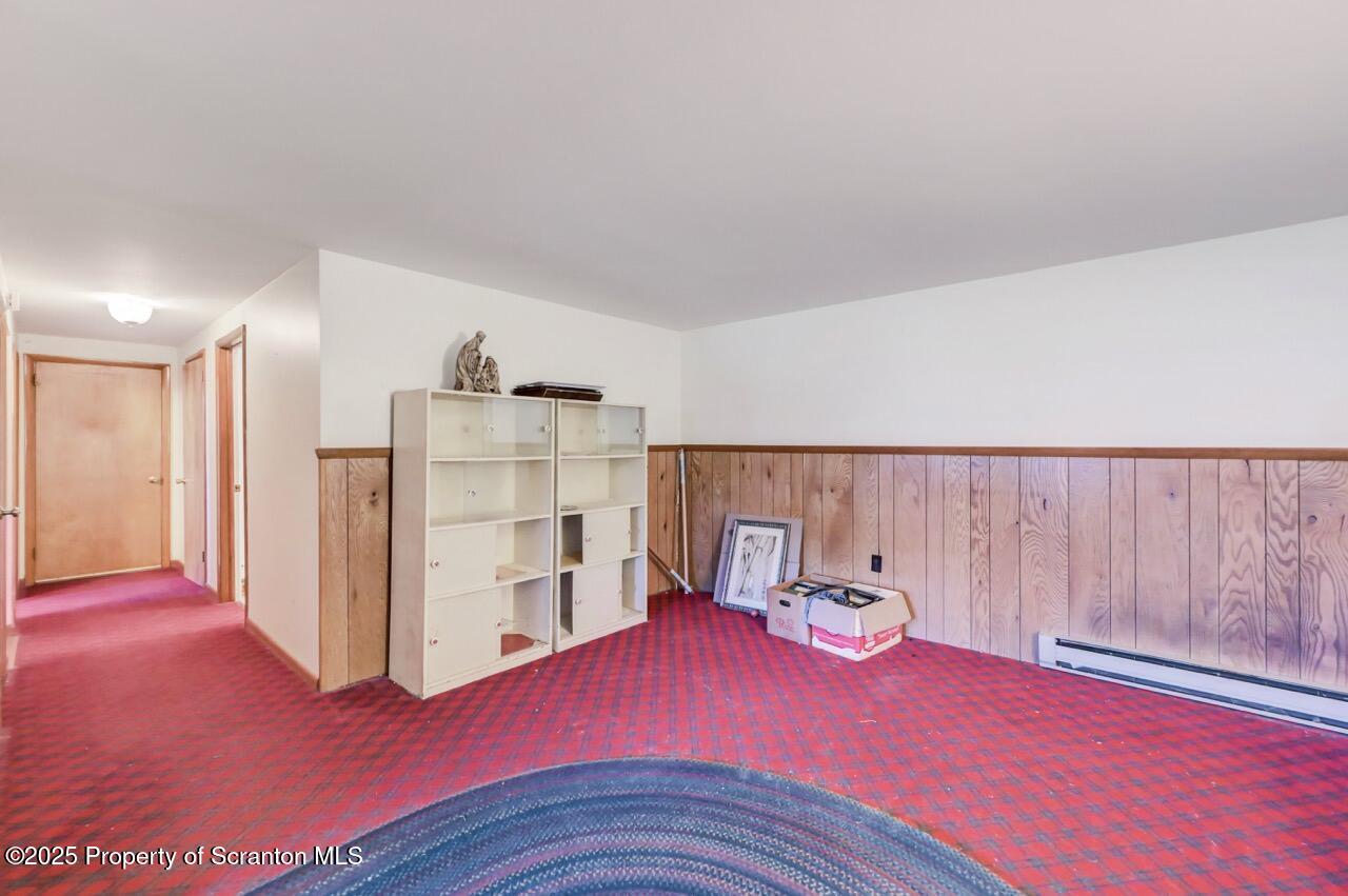 309 Lowery Street Scranton, PA 18505 - Photo 52 of 65 a view of a livingroom with furniture and wooden floor