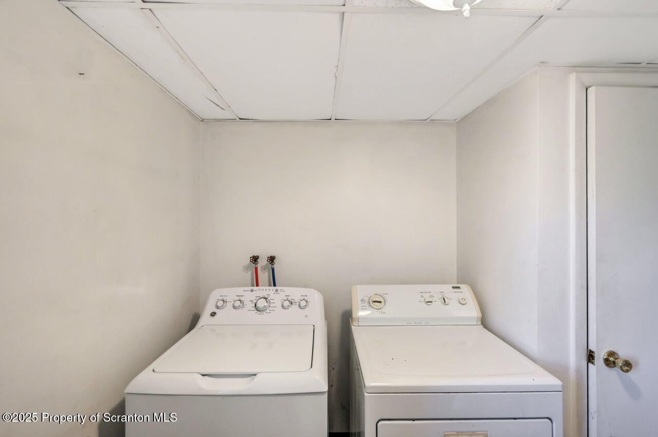 309 Lowery Street Scranton, PA 18505 - Photo 59 of 65 a utility room with dryer and washer