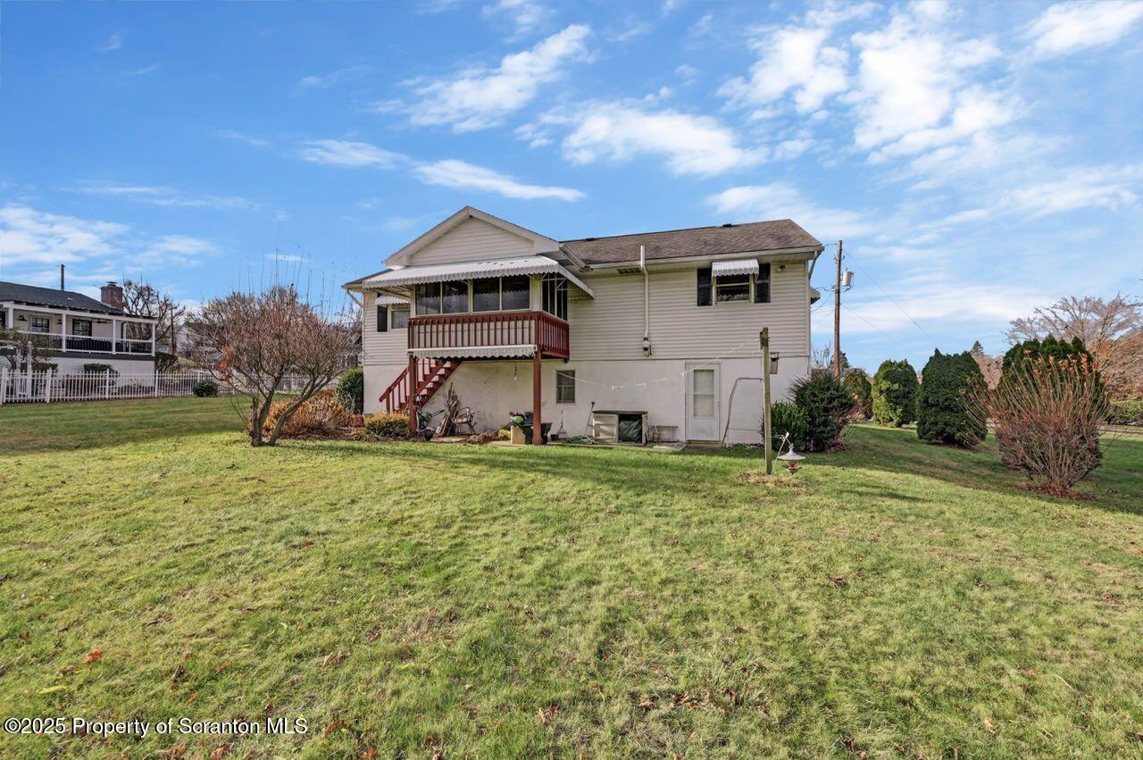 309 Lowery Street Scranton, PA 18505 - Photo 8 of 65 a front view of a house with a yard