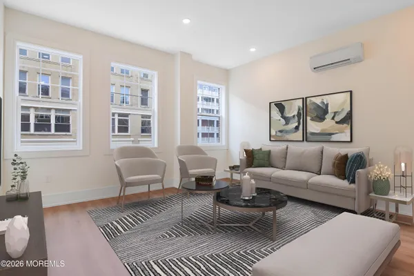 a living room with furniture or couch and a window