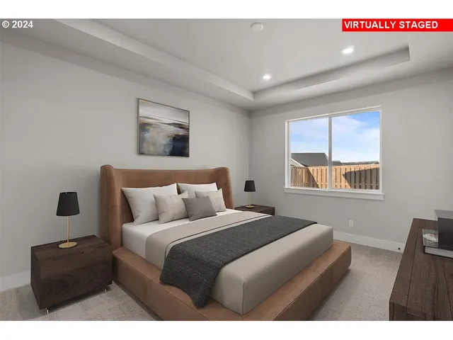 a bedroom with a bed window and couch