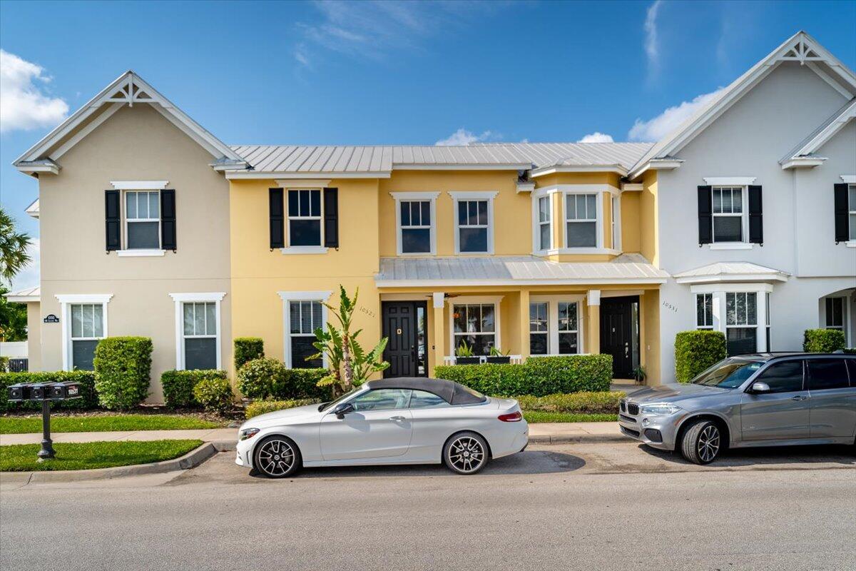 a car parked in front of a house
