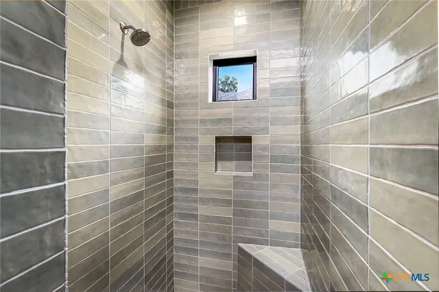 a view of hallway with wooden floor