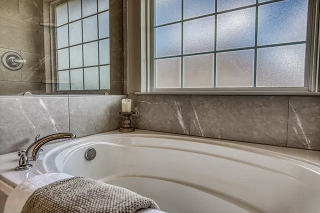 a bathroom with a bathtub