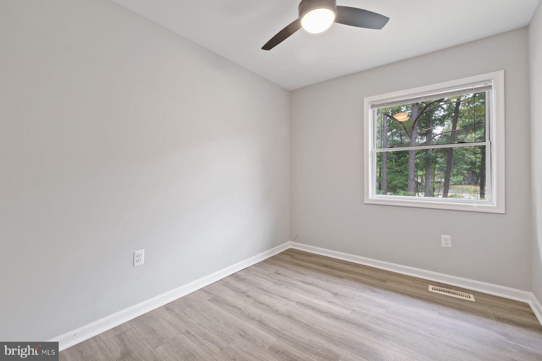 12537 Basque Place Woodbridge, VA 22192 - Photo 17 of 38 an empty room with a window