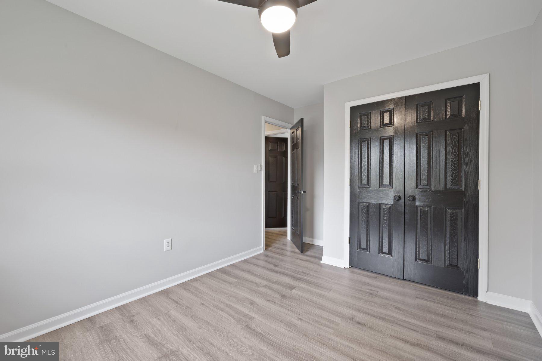 12537 Basque Place Woodbridge, VA 22192 - Photo 18 of 38 a view of an empty room with wooden floor