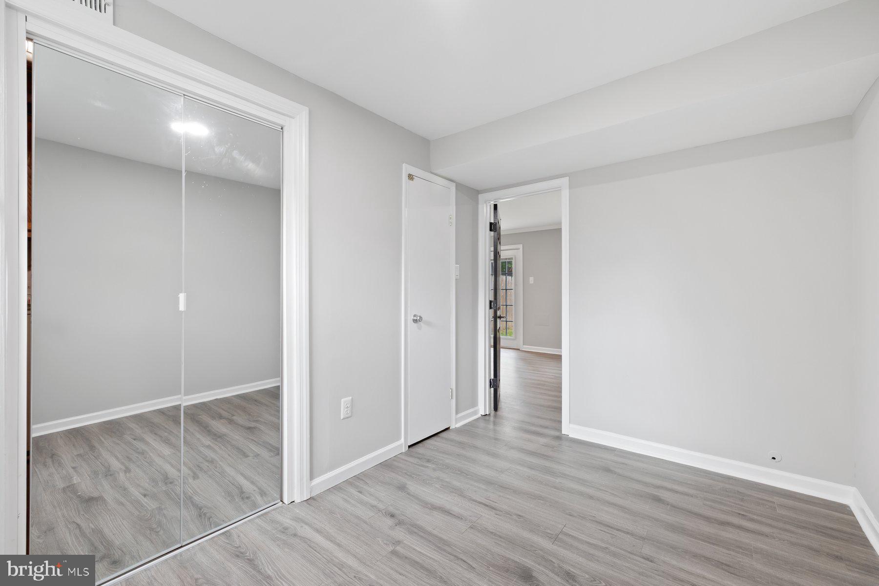 12537 Basque Place Woodbridge, VA 22192 - Photo 28 of 38 an empty room with wooden floor