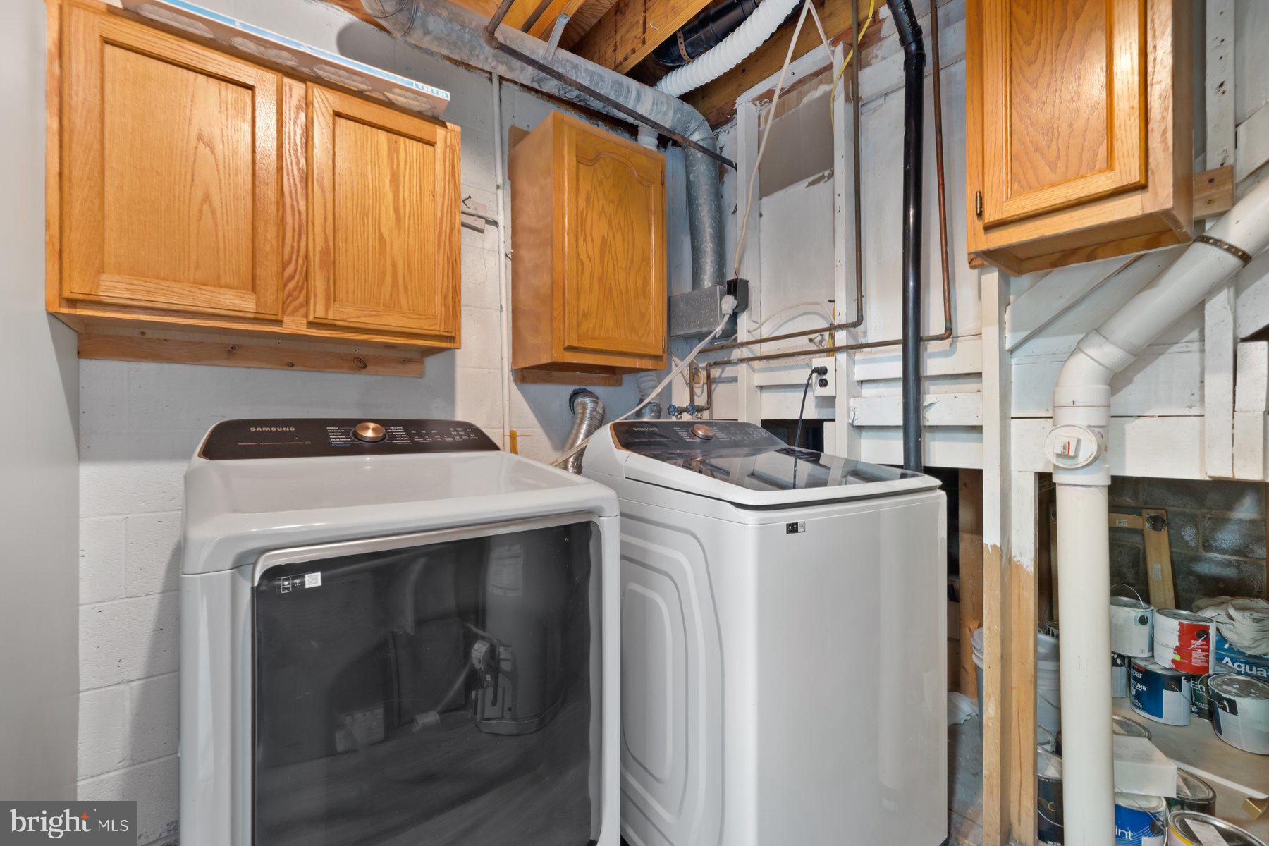 12537 Basque Place Woodbridge, VA 22192 - Photo 30 of 38 a utility room with sink dryer and washer