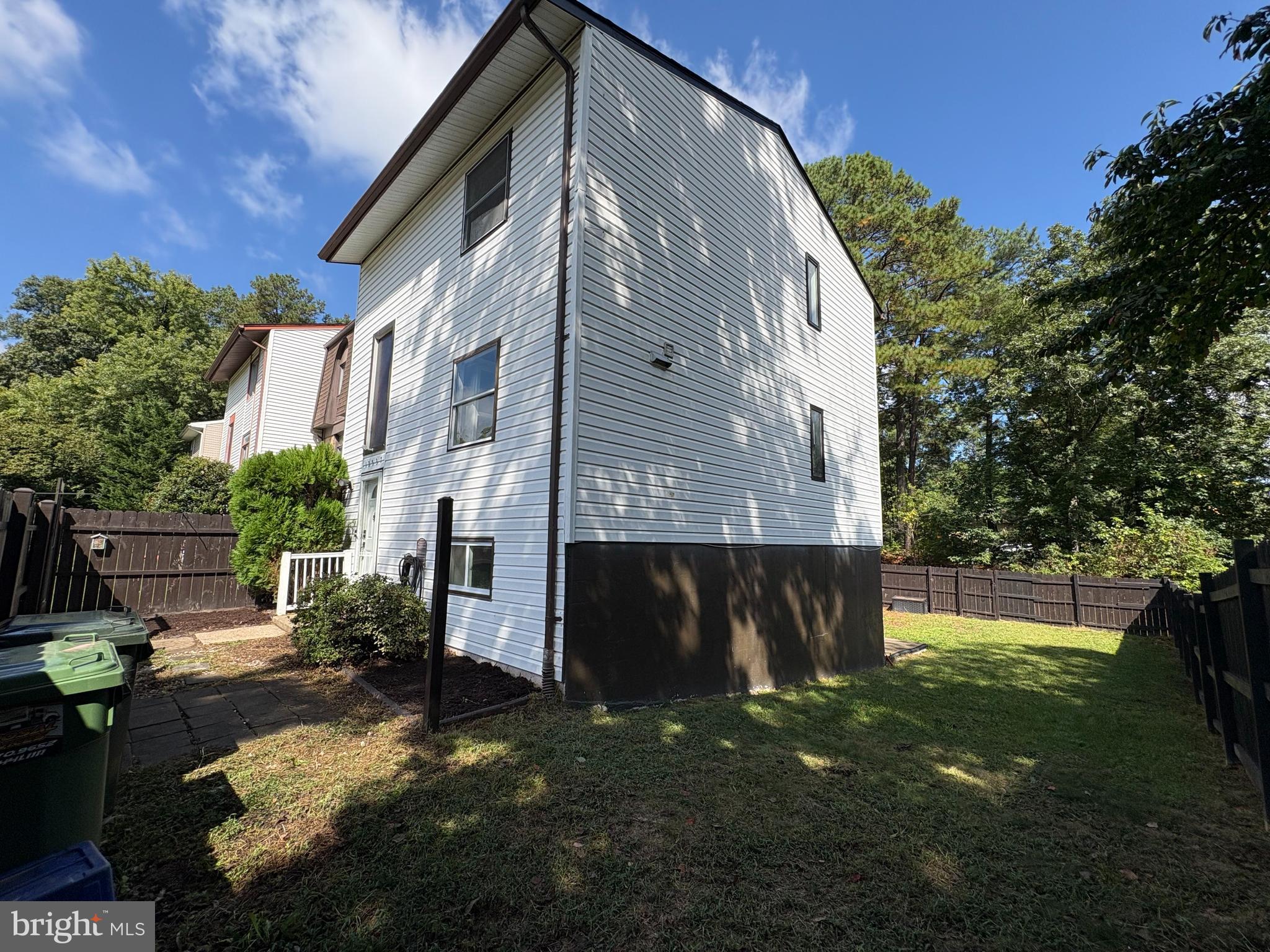 12537 Basque Place Woodbridge, VA 22192 - Photo 31 of 38 a view of a house with a yard