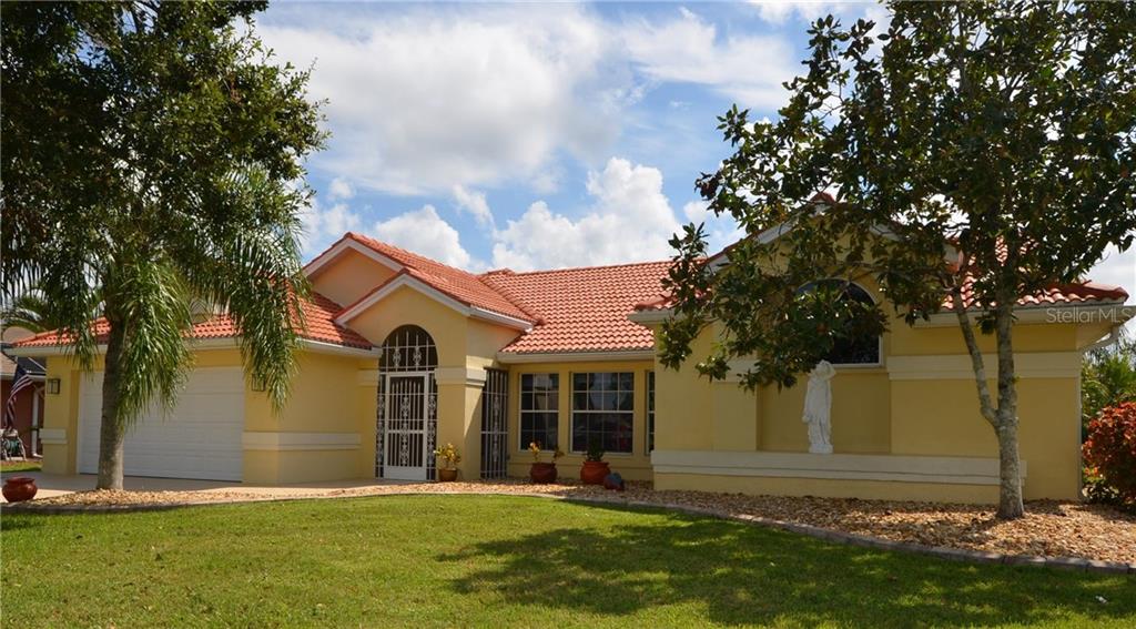 1086 Paraclete Road Punta Gorda, FL 33983 - Photo 1 of 1 CHARMING 3/2/2 SALTWATER POOL HOME IN DEED RESTRICTED DEEP CREEK WITH COUNTY WATER AND SEWER.