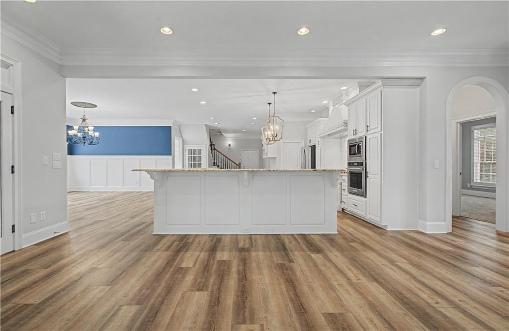 3045 Camp Branch Road Buford, GA 30519 - Photo 12 of 76 a view of kitchen and wooden floor