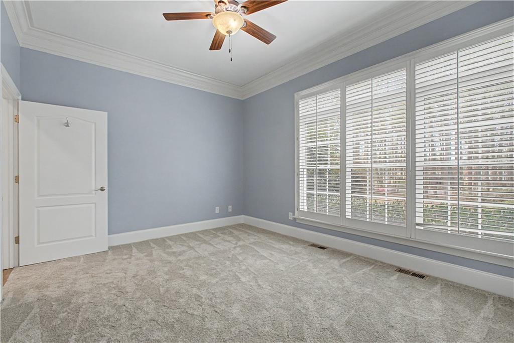 3045 Camp Branch Road Buford, GA 30519 - Photo 30 of 76 a view of an empty room with a window