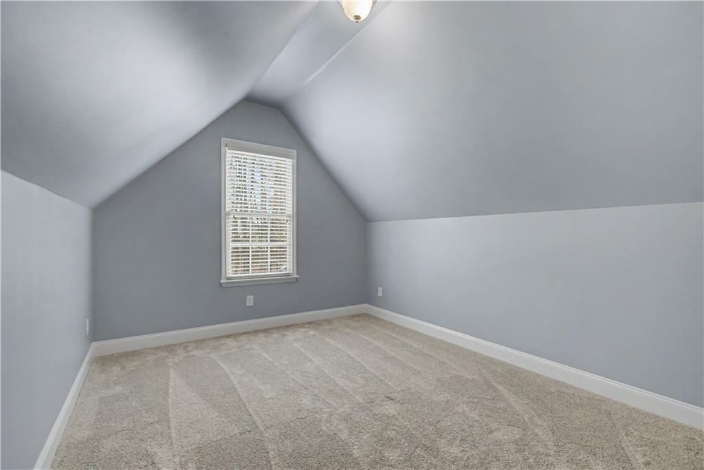 3045 Camp Branch Road Buford, GA 30519 - Photo 42 of 76 an empty room with windows and closet