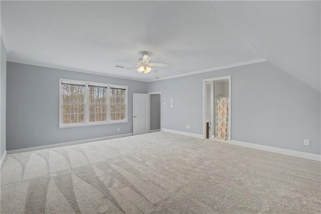 3045 Camp Branch Road Buford, GA 30519 - Photo 44 of 76 a view of an empty room with a window