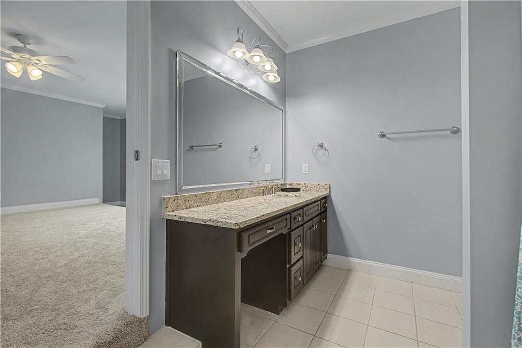 3045 Camp Branch Road Buford, GA 30519 - Photo 45 of 76 a utility room with cabinets and washer