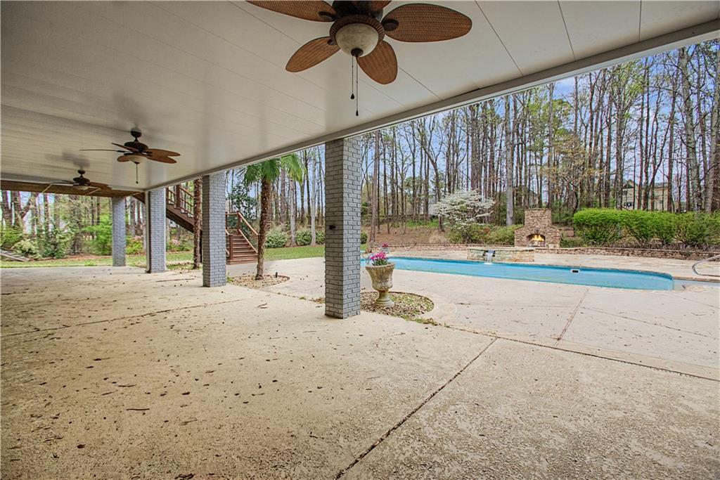3045 Camp Branch Road Buford, GA 30519 - Photo 58 of 76 a view of an entryway with a floor to ceiling window