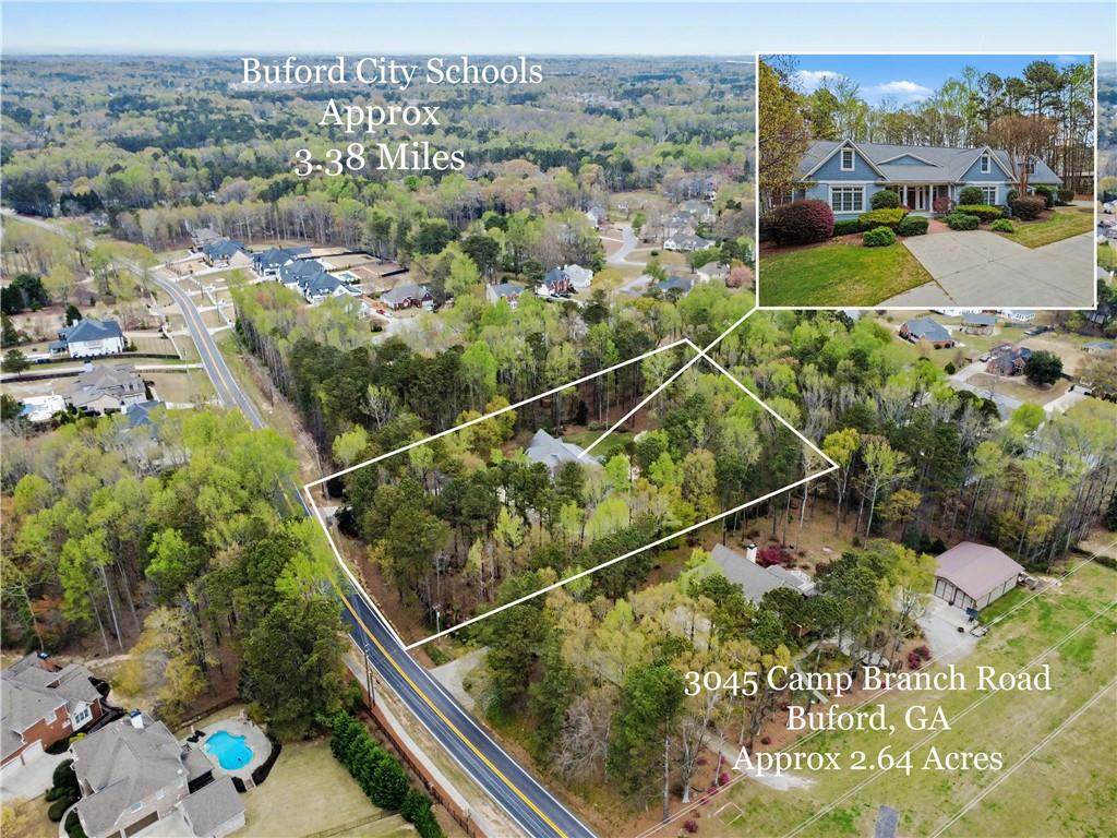 3045 Camp Branch Road Buford, GA 30519 - Photo 63 of 76 an aerial view of a residential houses with outdoor space and swimming pool