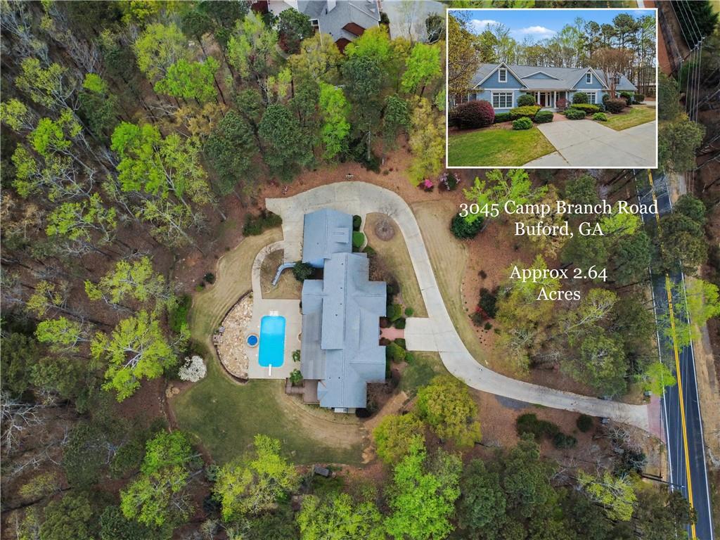 3045 Camp Branch Road Buford, GA 30519 - Photo 65 of 76 an aerial view of a house