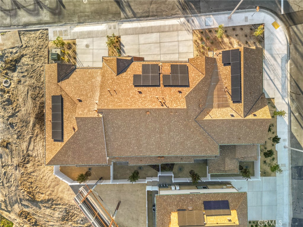 902 South Hert Street Colton, CA 92324 - Photo 2 of 34 a aerial view of a house with a swimming pool