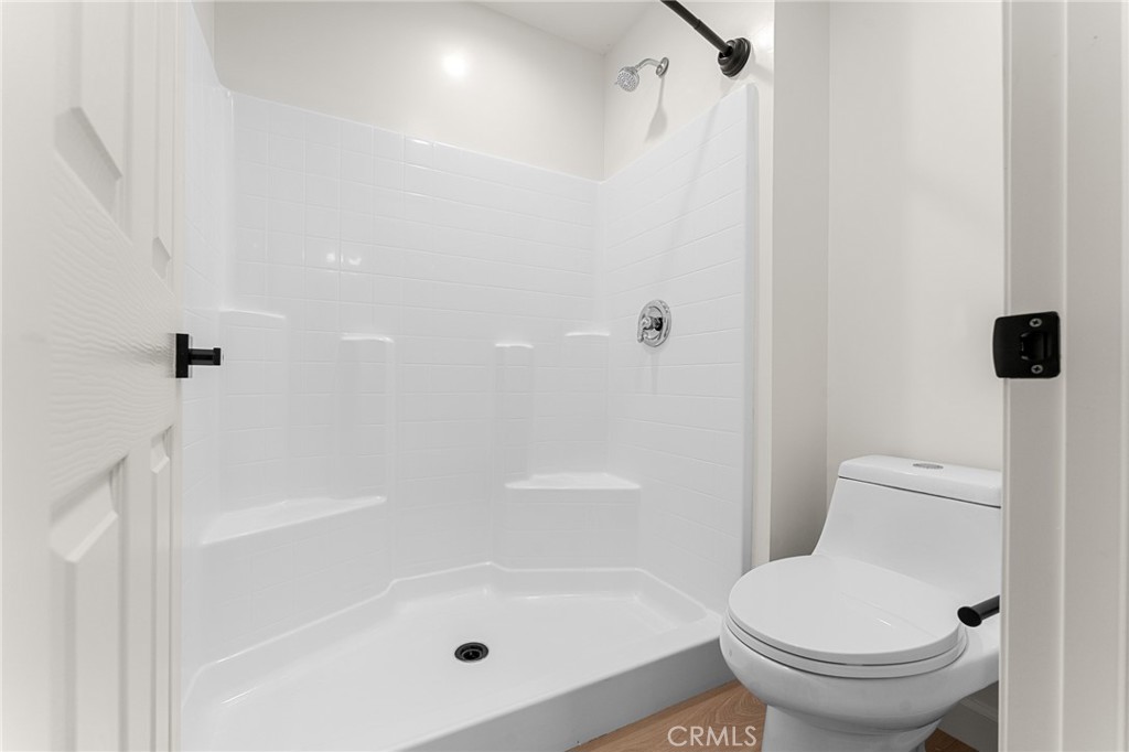 902 South Hert Street Colton, CA 92324 - Photo 24 of 34 a bathroom with a shower and a toilet