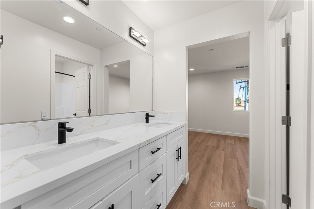902 South Hert Street Colton, CA 92324 - Photo 26 of 34 a bathroom with a sink and a mirror