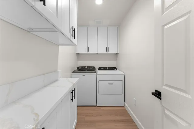 a bathroom with a granite countertop sink mirror and a shower