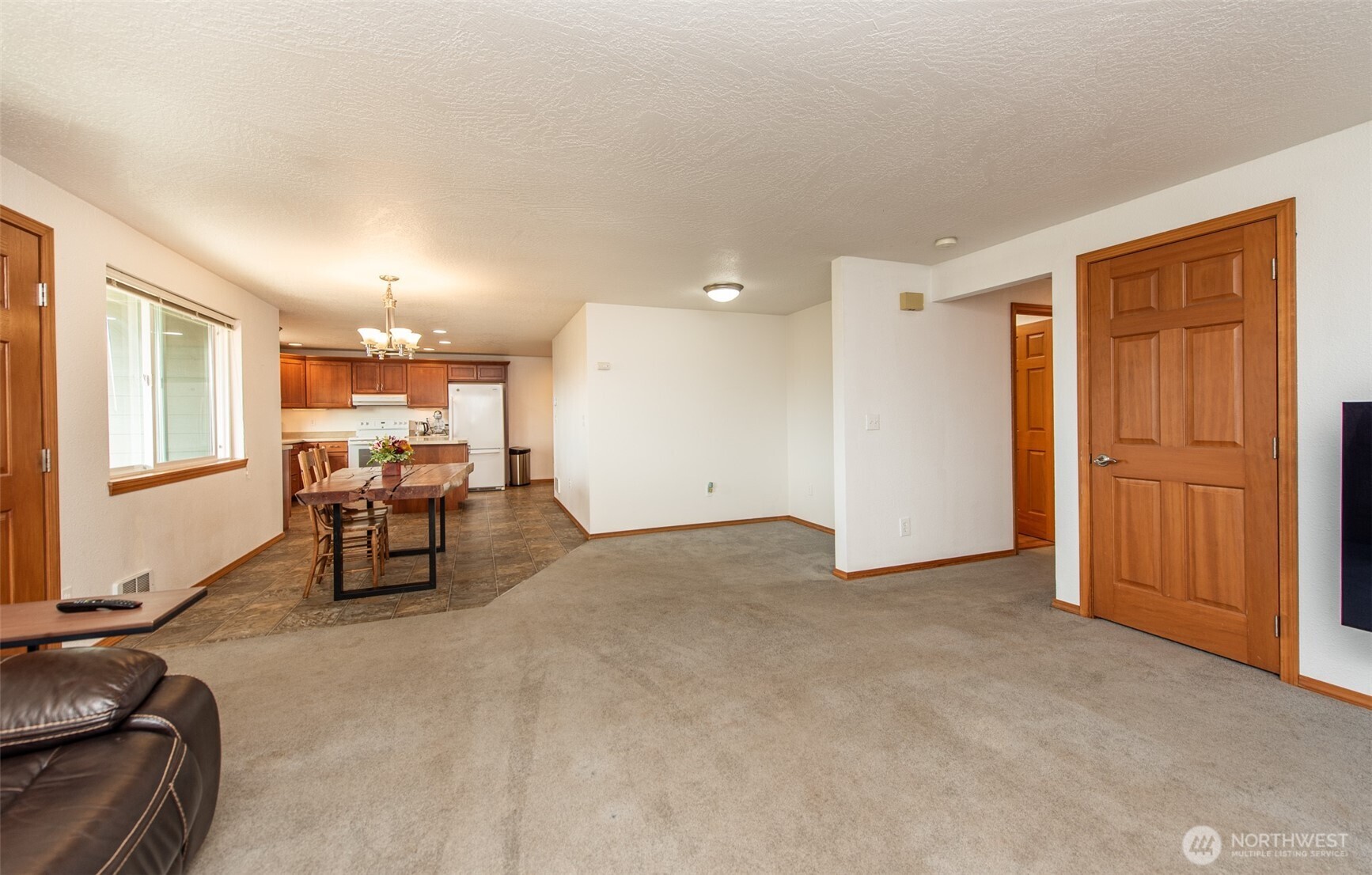 60 Ridge Place Sequim, WA 98382 - Photo 20 of 40 a view of a livingroom with furniture and a ceiling fan