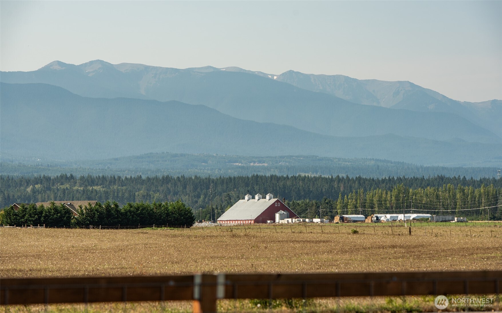 60 Ridge Place Sequim, WA 98382 - Photo 2 of 40 a view of a lake and a mountain view