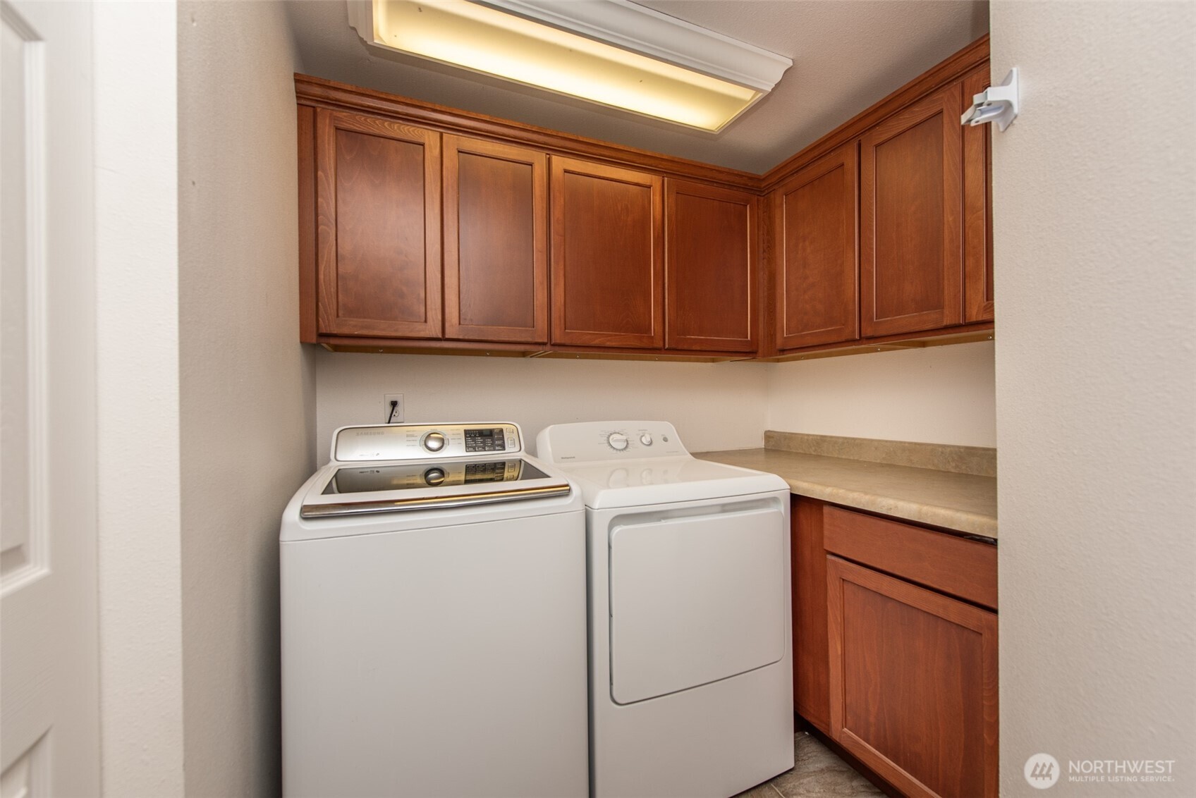 60 Ridge Place Sequim, WA 98382 - Photo 29 of 40 a utility room with dryer and washer