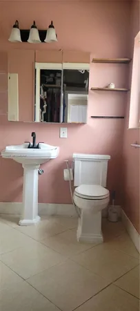 a backyard of a house with yard and outdoor seating