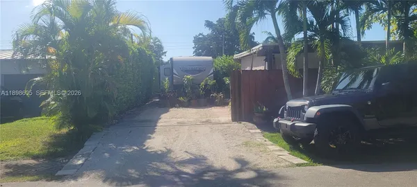 a bathroom with a bathtub and a window